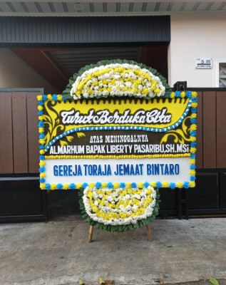 Papan Bunga Duka di Wania